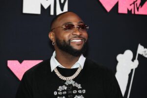 Davido Surprises Mayorkun With Tesla Cybertruck Worth Millions